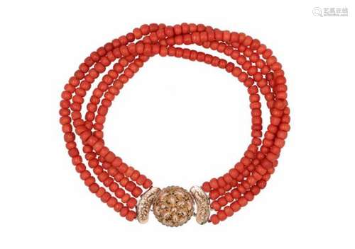 A four-strand red coral necklace with golden clasp. Diam. approx. 7.1 - 9 mm. Total weight approx.