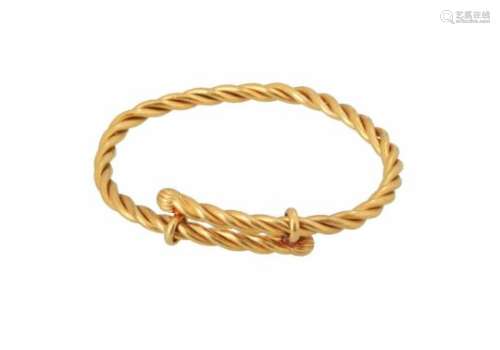 A 22-kt golden twisted bracelet. Total weight approx. 76.4 g.