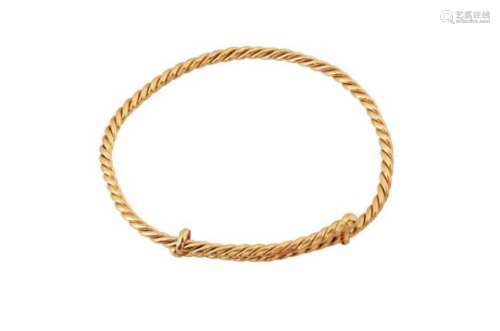 A 22-kt golden twisted bracelet. Total weight approx. 34.8 g.