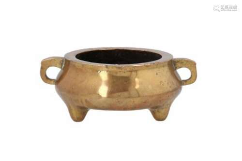 A bronze tripod censer with two handles. Marked with seal mark. China, 19th century. Total weight