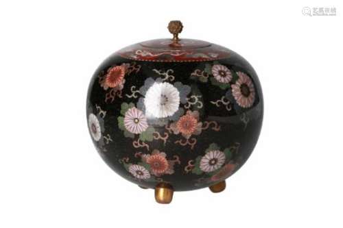A tripod cloisonné lidded jar, decorated with chrysanthemums and dragons. Unmarked. Japan, Meiji.