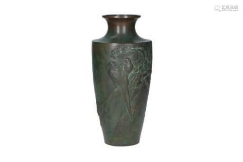A bronze vase with relief decor of birds. Marked with seal mark. Japan, 19th century. Total weight