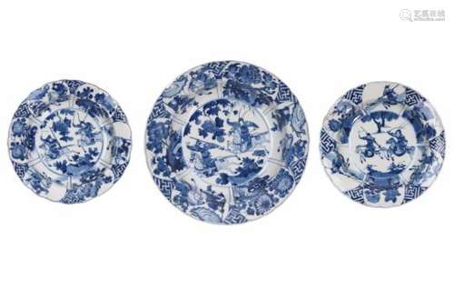 Lot of three blue and white porcelain bowls, decorated with warriors, horsemen and flowers. Marked