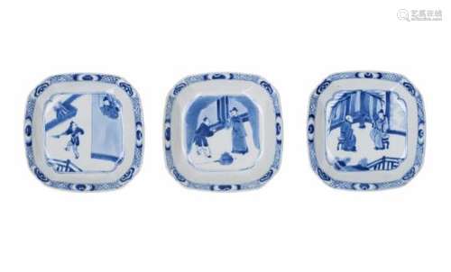 A set of three square blue and white porcelain bowls, decorated with figures on a terrace. Marked