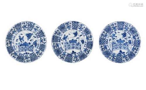 A set of three blue and white porcelain dishes, decorated with flowers. Marked with artemisia