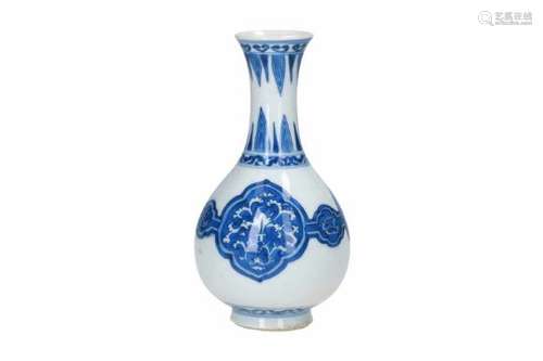 A blue and white porcelain vase, decorated with flowers and leaves. Unmarked. China, Kangxi.