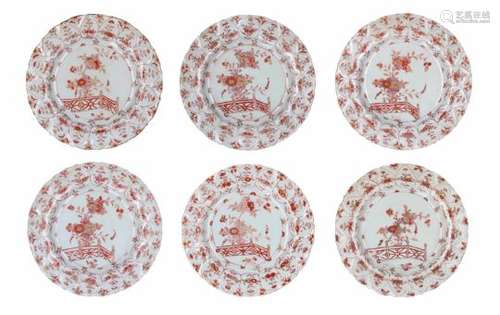 A set of six red and white dishes, decorated with flowers. Unmarked. China, 18th century.