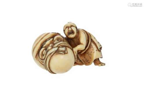 An ivory netsuke of a figure and Daruma. Signed Masayuki. Japan, 19th century. H. 3 cm.