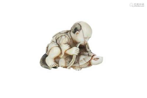 An ivory netsuke of a boy holding a rope with his teeth, sitting on a turtle. Signed Seizan.