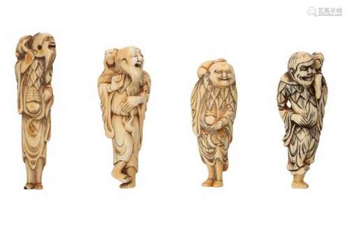 Lot of four netsuke, 1) ivory, standing Gama Sennin with toad. H. 8 cm. 2) ivory, dancing Gama