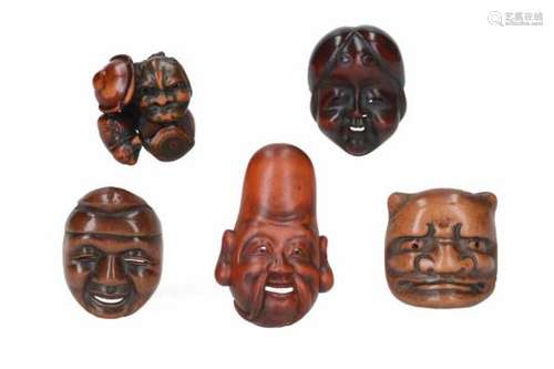 Lot of five netsuke, 1) wood, Fukurokuju mask. H. 6.5 cm. 2) wood, Oni mask. H. 4 cm. 3) wood, Ebisu