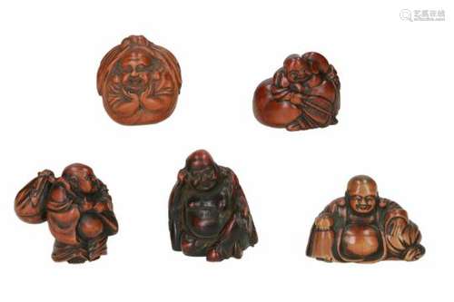 Lot of five netsuke, 1) wood, Hotei with fan and bag. Signed Toryusai. H. 3 cm. 2) ceramic,