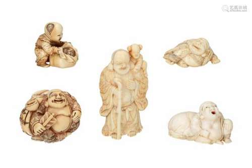 Lot of five netsuke, 1) ivory, two Hotei's with fan. H. 4 cm. 2) ivory, reclining Hotei. L. 4 cm. 3)