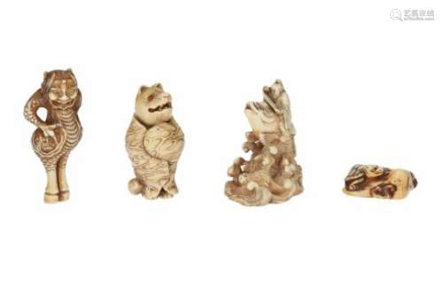 Lot of four netsuke, 1) ivory, minogame on a rock. L. 3 cm. 2) ivory, Kinko with scroll on a carp in