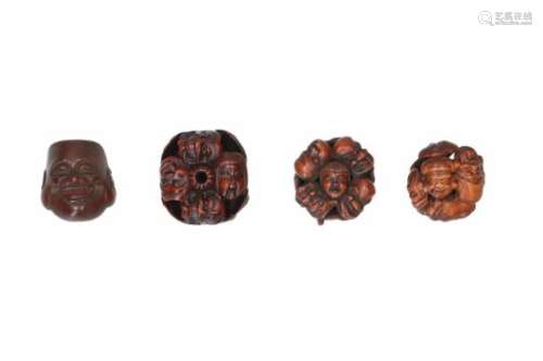 Lot of four netsuke, 1) wood, Hotei mask. Signed. H. 3.5 cm. 2) boxwood, nine masks. L. 4 cm. 3)