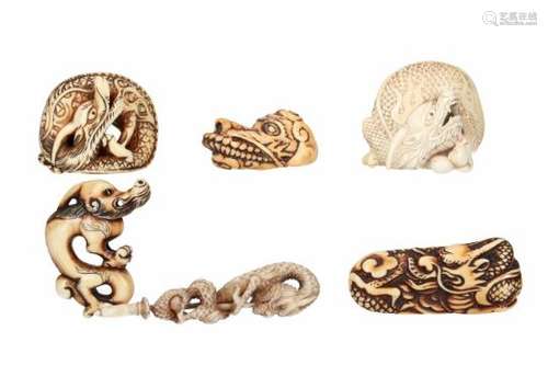 Lot of six netsuke, 1) ivory, dragon in clouds. L. 6 cm. 2) ivory, curled up dragon with moving ball