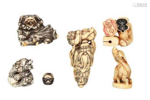 Lot of five nestuke and one ojime, 1) ivory, devil hunter holding Oni. H. 7.5 cm. 2) ivory, shishi