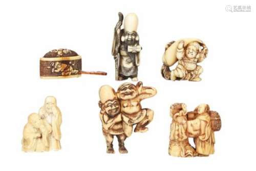 Lot of six netsuke, 1) ivory, Daikoku carrying two-forked radish. Signed Tomochika. H. 3 cm. 2)