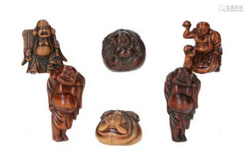 Lot of six netsuke, 1) boxwood, standing Hotei. H. 6 cm. 2) wood, Hotei with tama, treasure bag