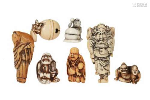 Lot of seven netsuke, 1) ivory, Karasu Tengu with scroll. H. 4 cm. 2) ivory, Ebisu and mermaid.