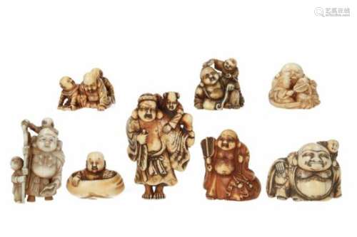 Lot of eight netsuke, 1) ivory, sitting Hotei with scepter and karako with fan. Signed Ryôichi. H. 3