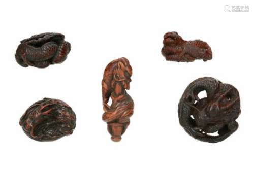 Lot of five netsuke, 1) wood, dragon with sword. H. 6 cm. 2) wood, curled up dragon with ball.