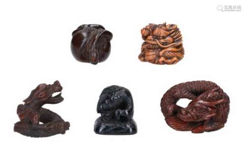 Lot of five netsuke, 1) wood, rain dragon with ash tray. Signed Toryu. H. 3 cm. 2) wood, curled up