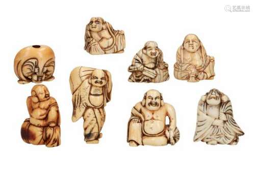 Lot of eight netsuke, 1) staghorn, standing Hotei with bag. H. 5 cm. 2) ivory, sitting Hotei with