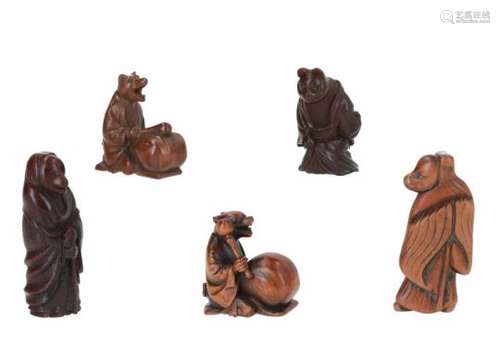 Lot of five netsuke, 1) wood with ivory, Tanuki with drum. Signed Jukekazu. H. 4 cm. 2) wooden fox