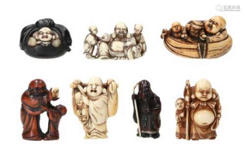 Lot of seven netsuke, 1) ivory, Hotei and two karako in a boat. Signed. L. 5 cm. 2) ivory, sitting