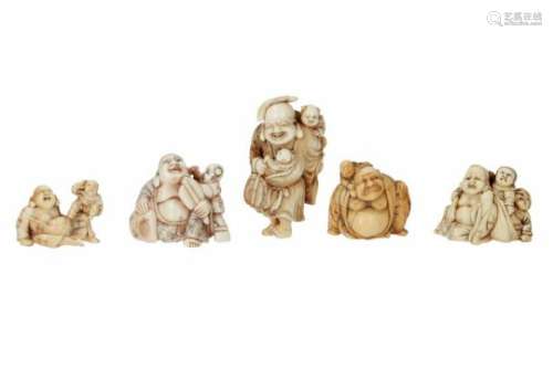 Lot of five netsuke, 1) ivory, standing Hotei with leaves on his head, with karako and fan. Signed