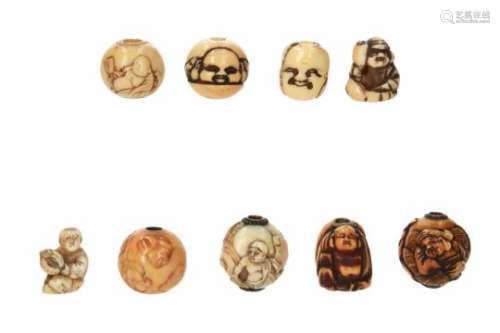 Lot of nine ojime, 1) ivory, Daikoku, Ebisu and rice bales. H. 2 cm. 2) ivory, the seven lucky gods.