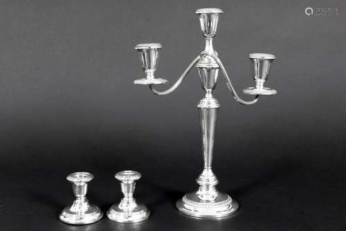 pair of small English candlesticks and an American candelabra in marked silver - - [...]