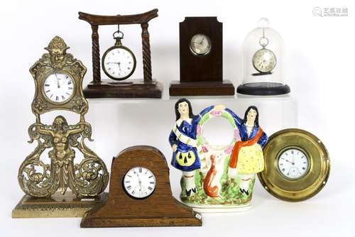 collection of 7 old and antique watch stand each with its pocket watch - - [...]