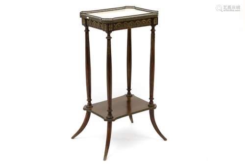 small 'antique' neoclassical occasional table with mountings in bronze and with a [...]