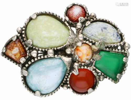 Broche met diverse stenen.