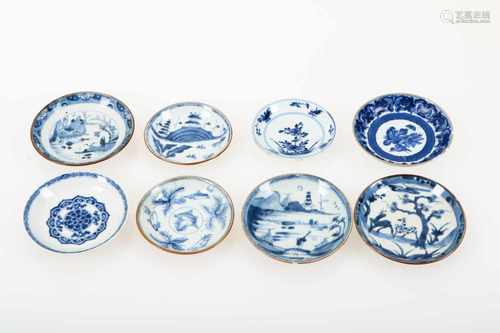 Een lot van (8) porseleinen Batavia ware schoteltjes met onder andere sybille merian decor. China,