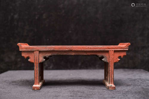 A small hardwood console table