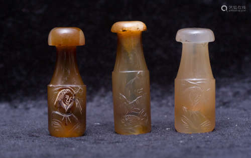 Three agate carved cigarette holders