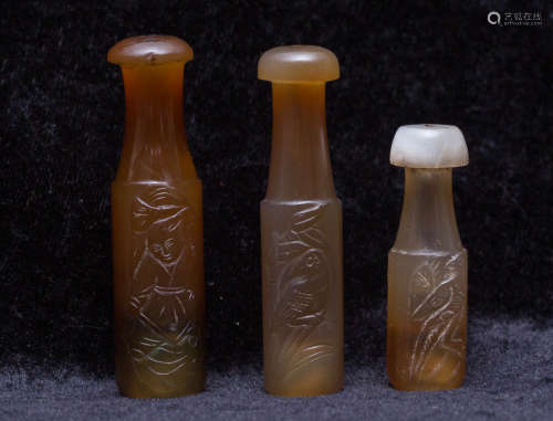 Three agate carved cigarette holders