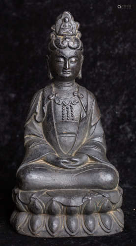 Copper statue of seated Guan Yin buddha