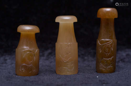 Three agate carved cigarette holders