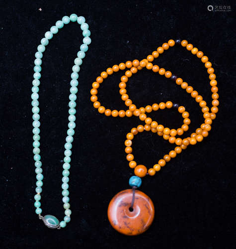 Emerald and amber necklaces