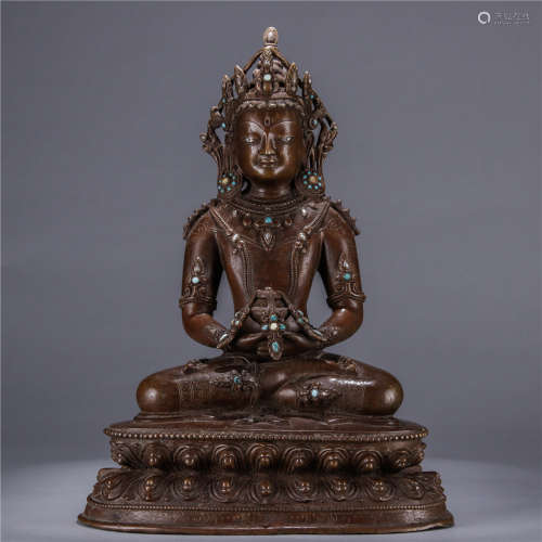 A Chinese Bronze Buddha Embeded Silver