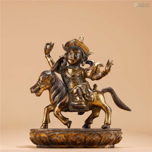 A Chinese Gilt Bronze Buddha With Horse