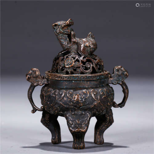 A Chinese Bronze Tripod Censer With Lion Shaped