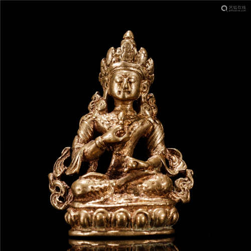 A Chinese Bronze Buddha With Golden Painting