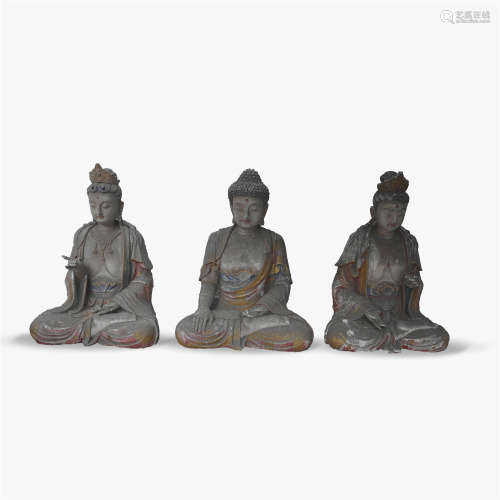 Three clay wood statues of buddha