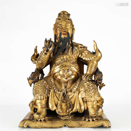 DA MING YONG LE gilt bronze statue of seated GUAN GONG
