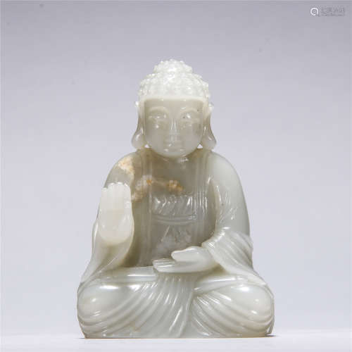 White jade carved statue of Sakyamuni Buddha